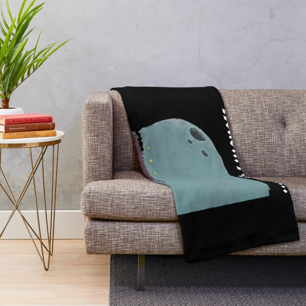 Slay the Spire inspired Neow plush blanket featuring the game's iconic whale character