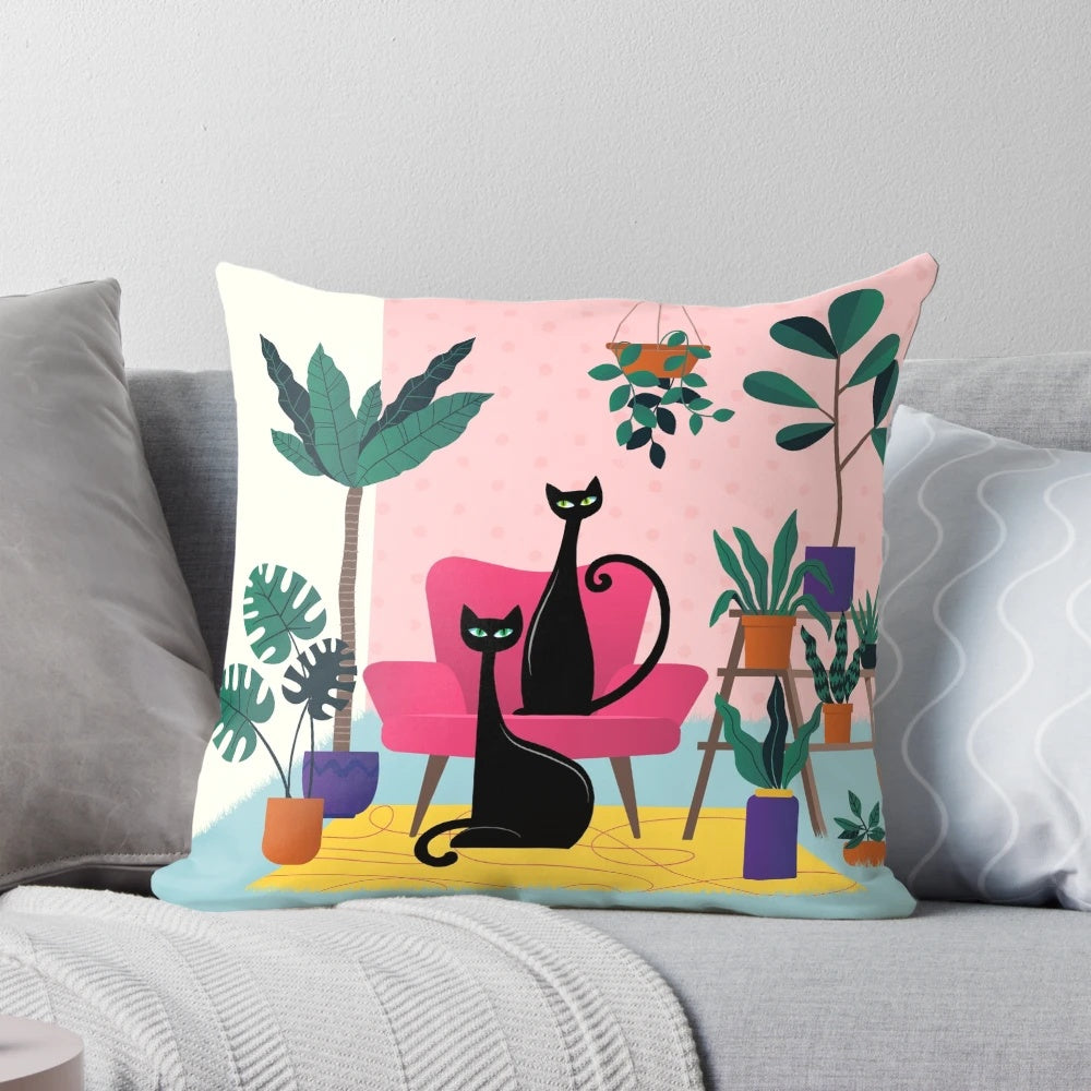 Stylish black cat pillow with lush tropical plants and mid-century modern accents