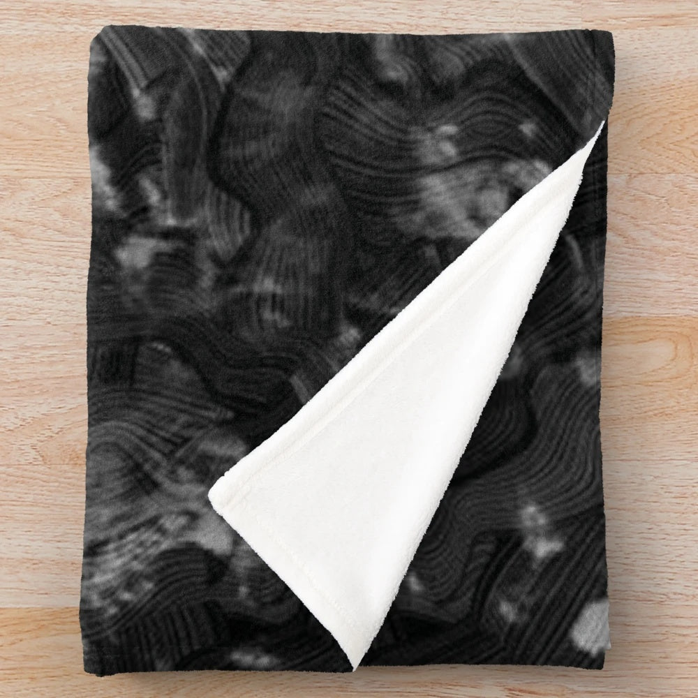 Forged carbon fiber plush blanket