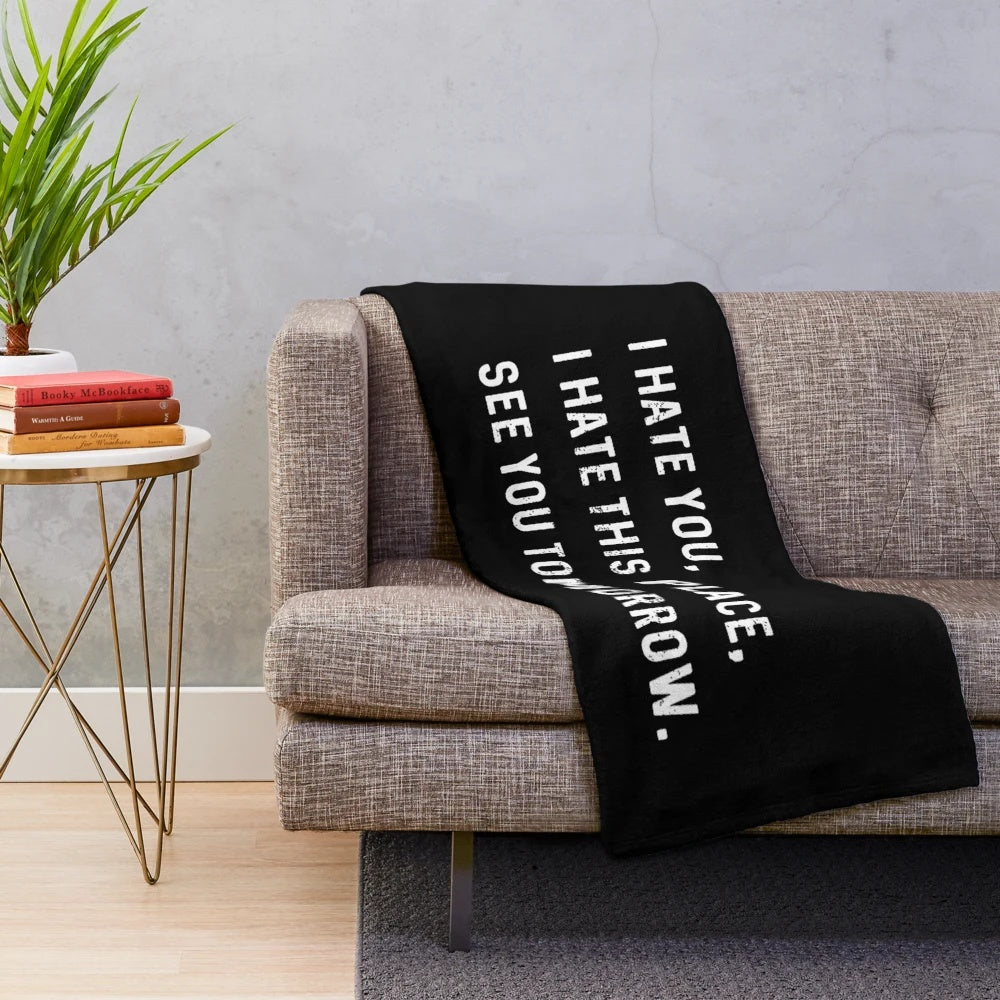 Snarky plush blanket with "I hate you. I hate this place. See you tomorrow" text