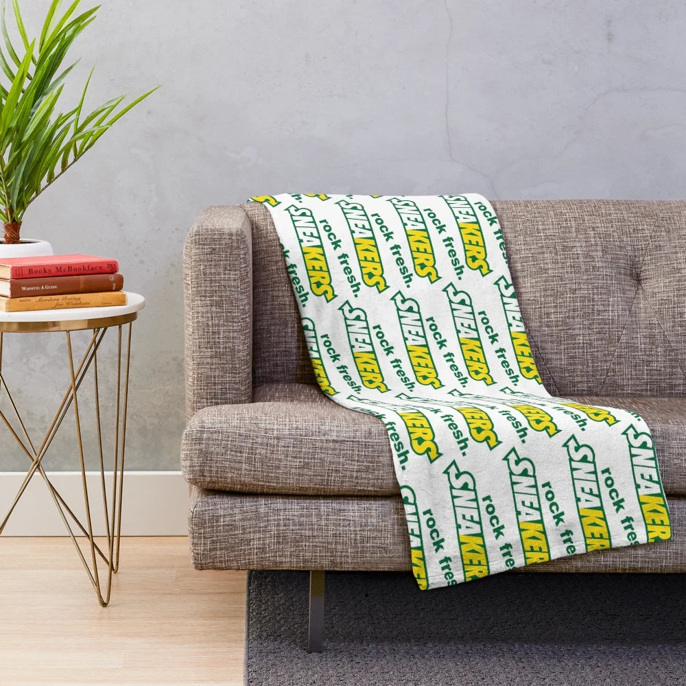 Sneaker-inspired plush blanket with urban fashion and retro style elements