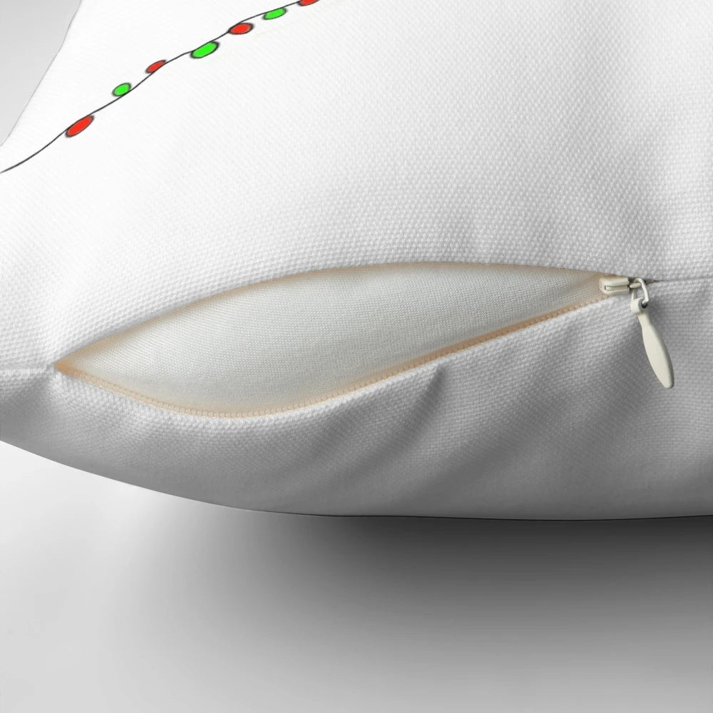 A festive pillow featuring a sneaky looking greyhound or sighthound dog breed, perfect for holiday home decor.