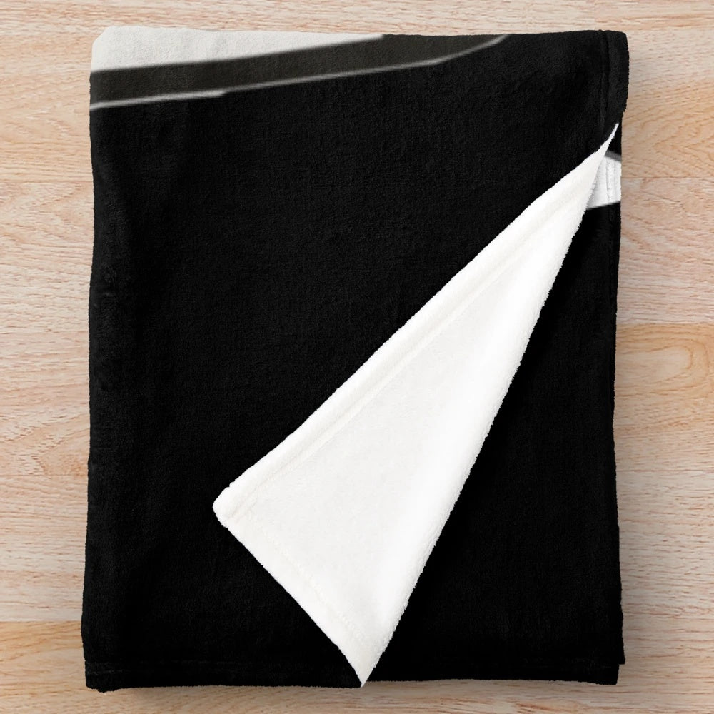 A soft and cozy plush blanket with a Nutella-inspired design