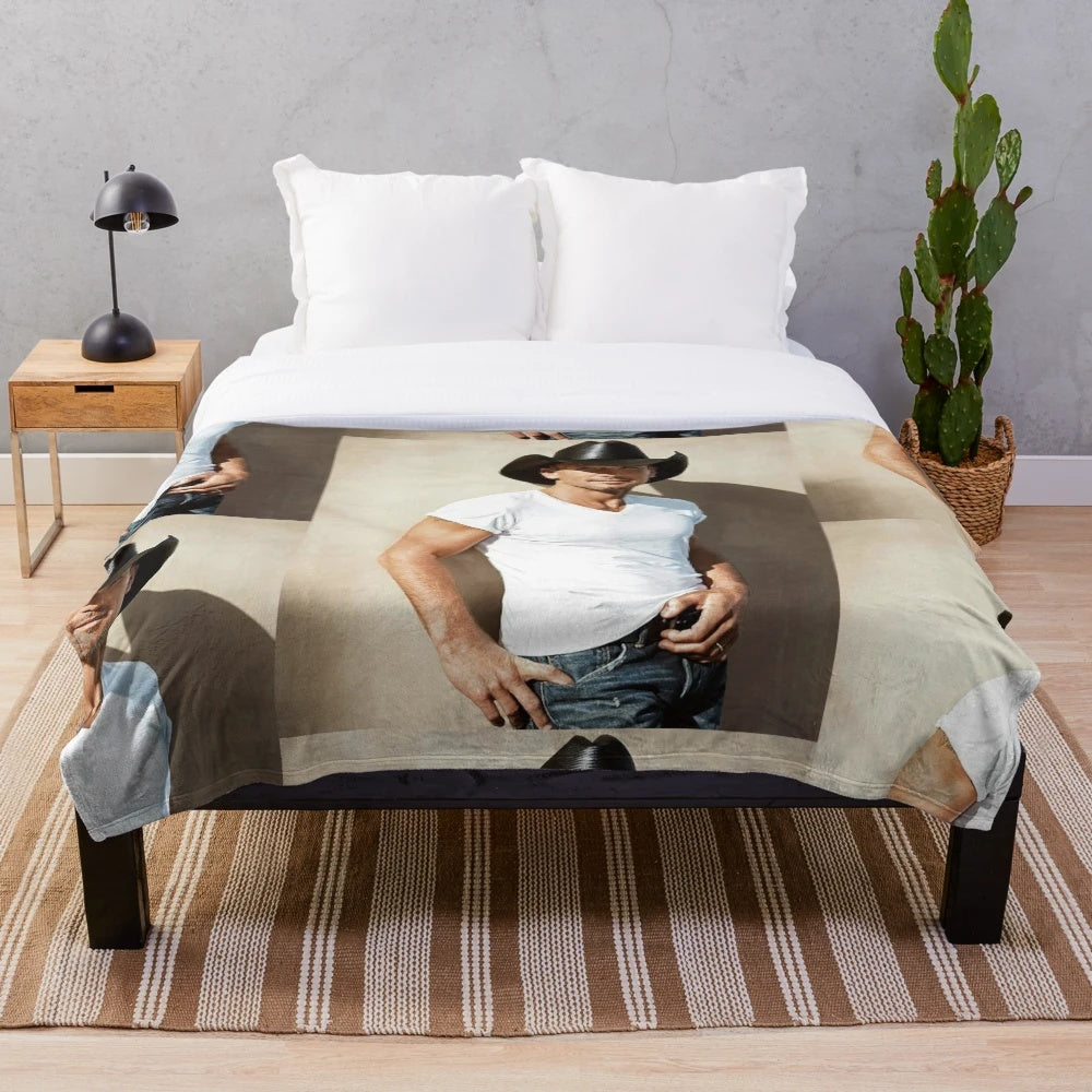 Anti-plush blanket with cozy, soft texture and Tim McGraw-inspired design