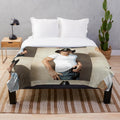 Anti-plush blanket with cozy, soft texture and Tim McGraw-inspired design