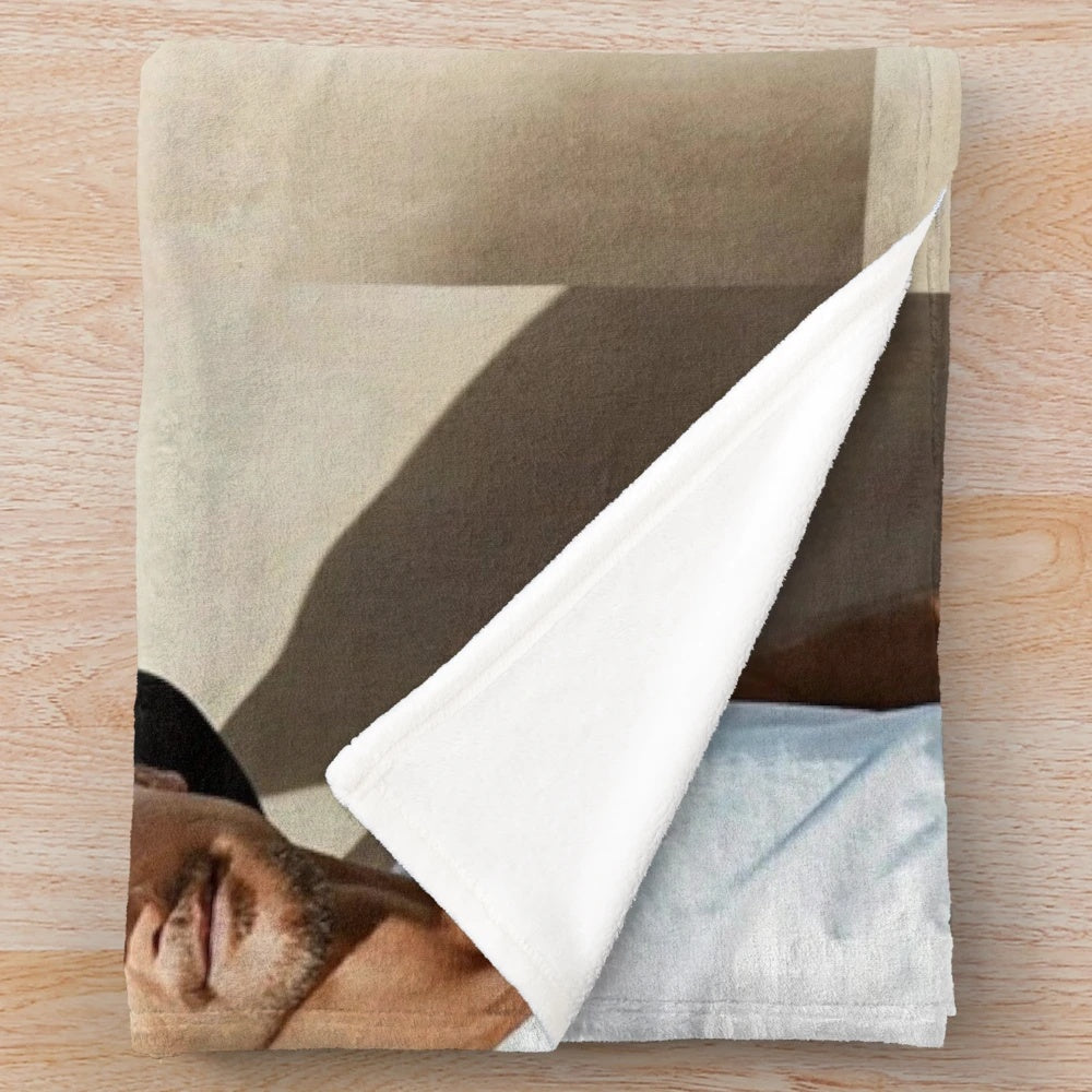 Anti-plush blanket with cozy, soft texture and Tim McGraw-inspired design