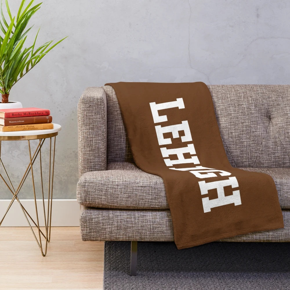 Soft and cozy plush blanket featuring the Lehigh Mountain Hawks wordmark logo