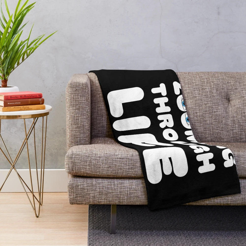 Plush blanket with a photographer-themed design