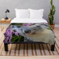Soft and cozy plush blanket featuring adorable koalas and Cooktown orchids