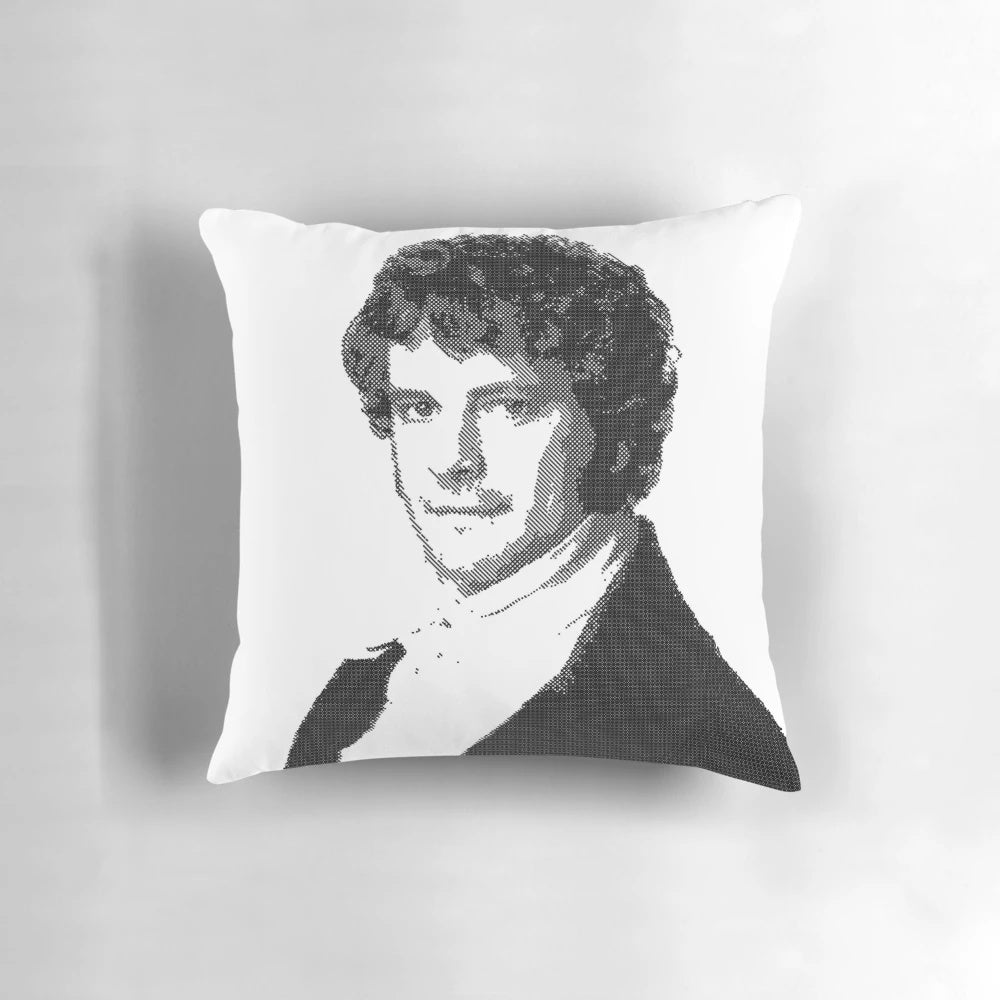 Decorative pillow featuring a portrait of Mr. Darcy from the classic Jane Austen novel Pride and Prejudice.