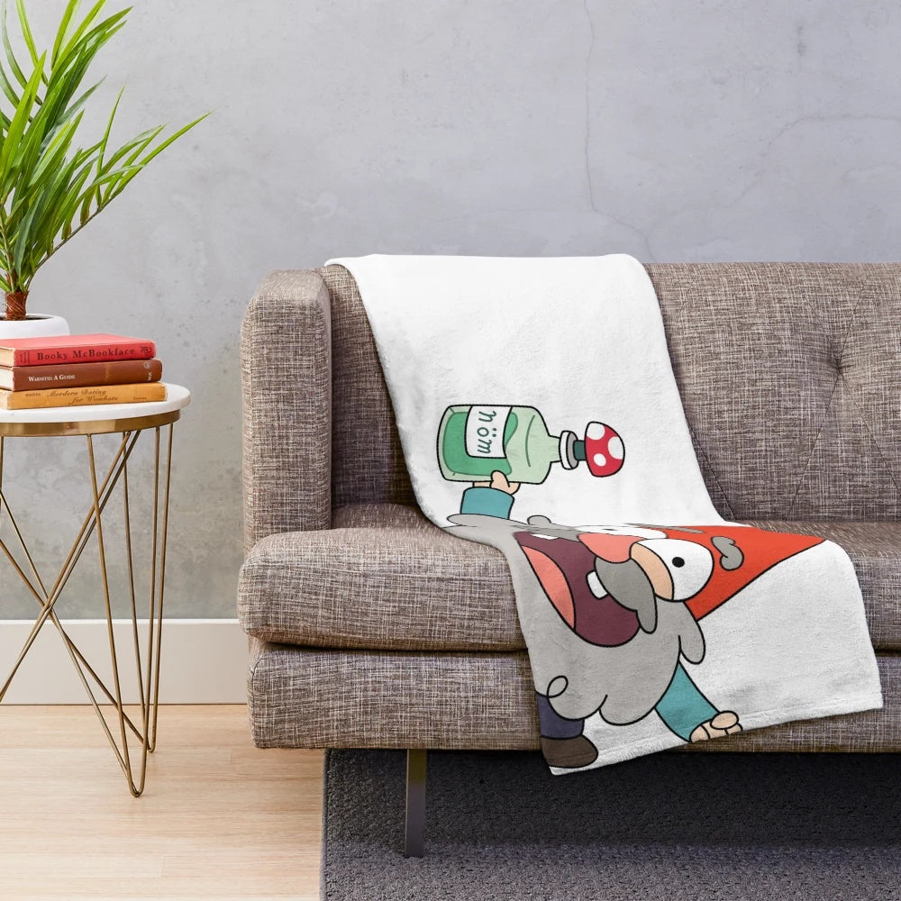 Shmebulock the Gravity Falls gnome featured on a cozy plush blanket