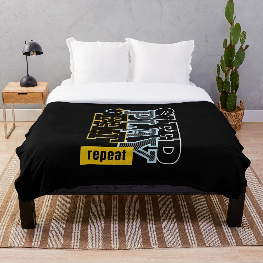 Plush blanket for gamers and gaming enthusiasts