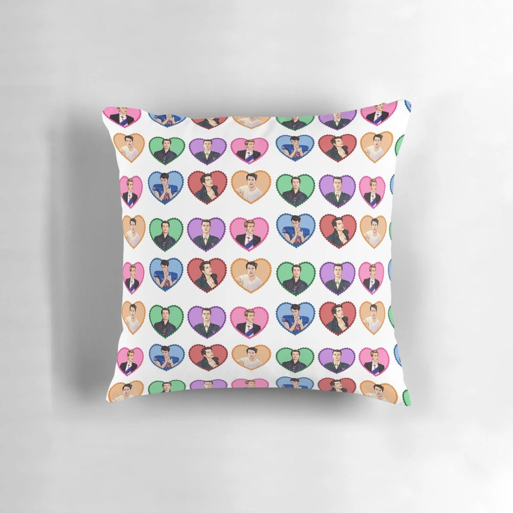 A cozy pillow featuring the characters from the LGBTQ+ novel 'Red, White & Royal Blue', including Nicholas Galitzine, Alex Claremont-Diaz, and more.