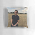 A plush, comfortable pillow featuring a portrait of actor Tom Holland as the superhero Spider-Man.