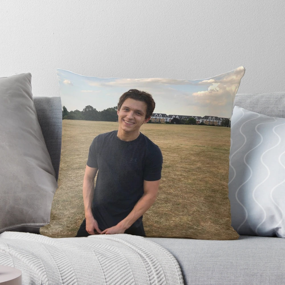 A plush, comfortable pillow featuring a portrait of actor Tom Holland as the superhero Spider-Man.