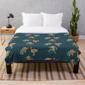 Plush animal print blanket with forest animal designs