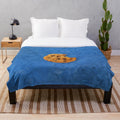 Cookie-themed plush blanket featuring the iconic Cookie Monster design
