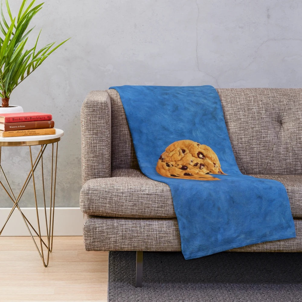 Cookie-themed plush blanket featuring the iconic Cookie Monster design