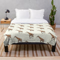 Soft, plush giraffe-patterned blanket