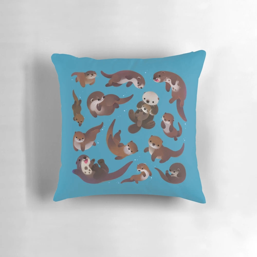 Soft, plush pillow in the shape of an otter, perfect for cuddling and comfort.