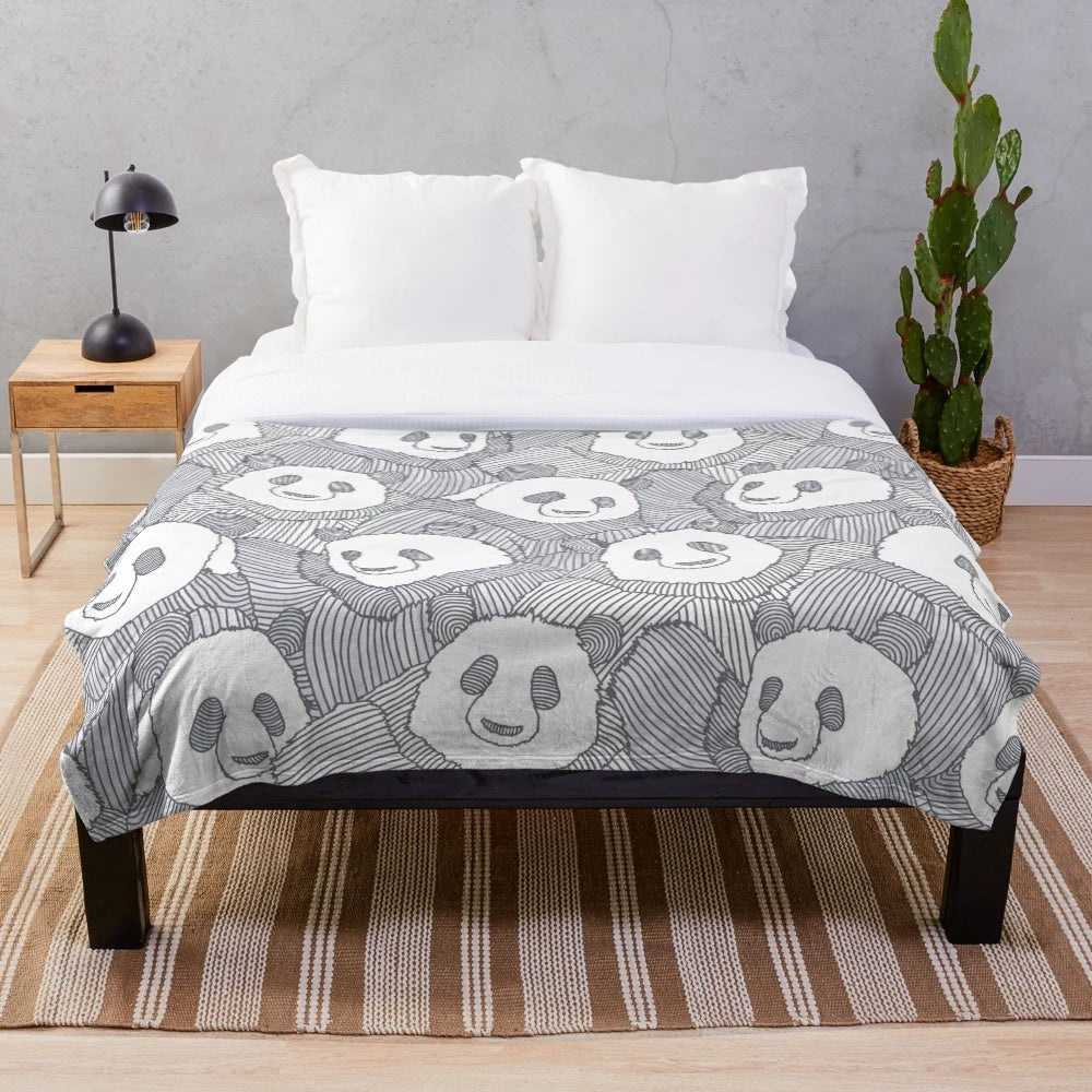 Snuggly panda-themed plush blanket with a simple, cute design
