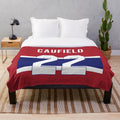 Soft and cozy plush blanket featuring a hockey theme for sports enthusiasts