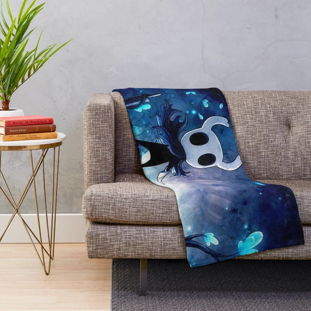 Soft, plush blanket featuring Hollow Knight inspired design