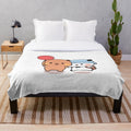 Soft and cuddly plush blanket featuring a cute bear and panda design