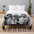 Plush blanket with cuddly cartoon characters