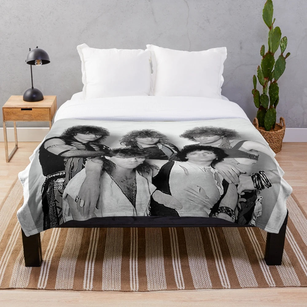 Plush blanket with cuddly cartoon characters