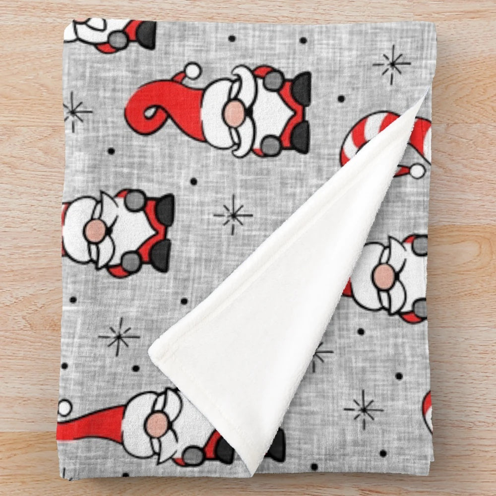 Grey plush blanket with festive Christmas gnomes