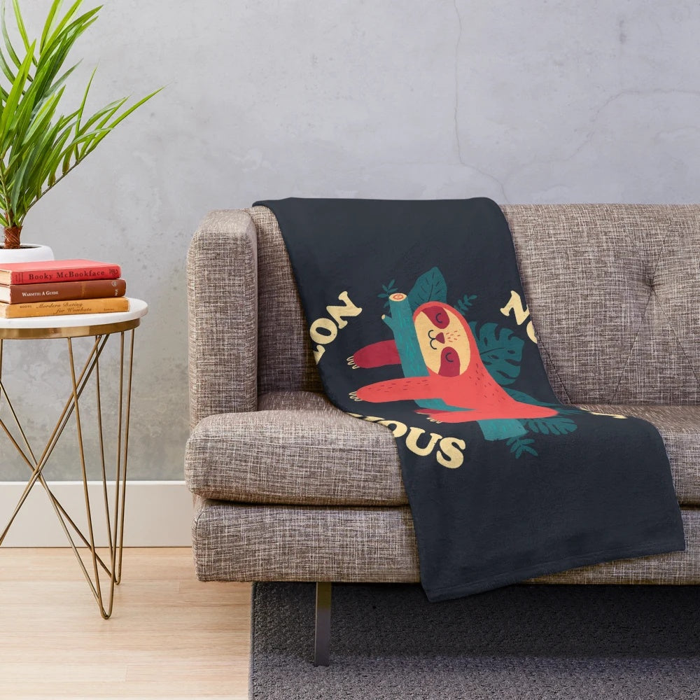 Soft, plush sloth-themed blanket for cozy naps and relaxation