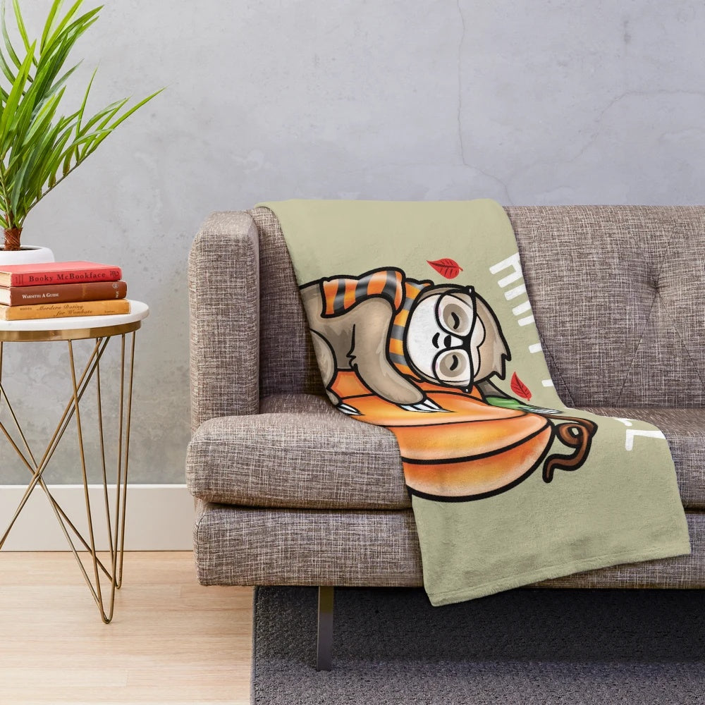 Soft and cuddly plush blanket featuring a sloth hugging a pumpkin in a fall setting
