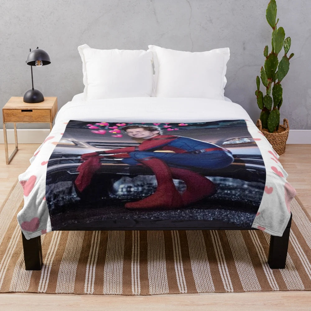 Soft and cozy plush blanket with a cute Tom Holland design