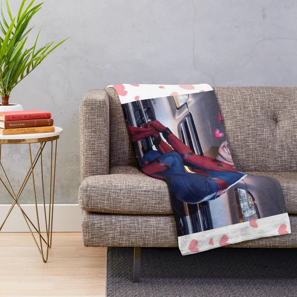 Soft and cozy plush blanket with a cute Tom Holland design