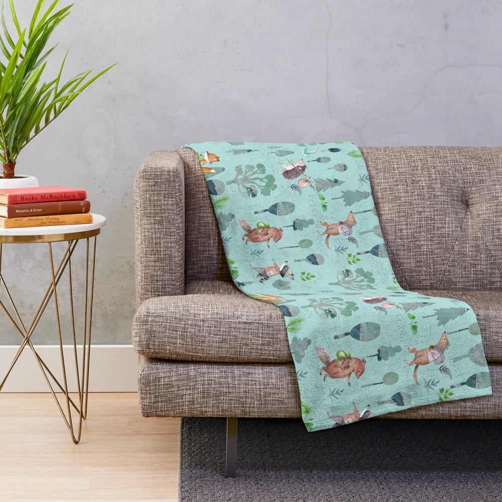 Cozy plush blanket with woodland forest animals