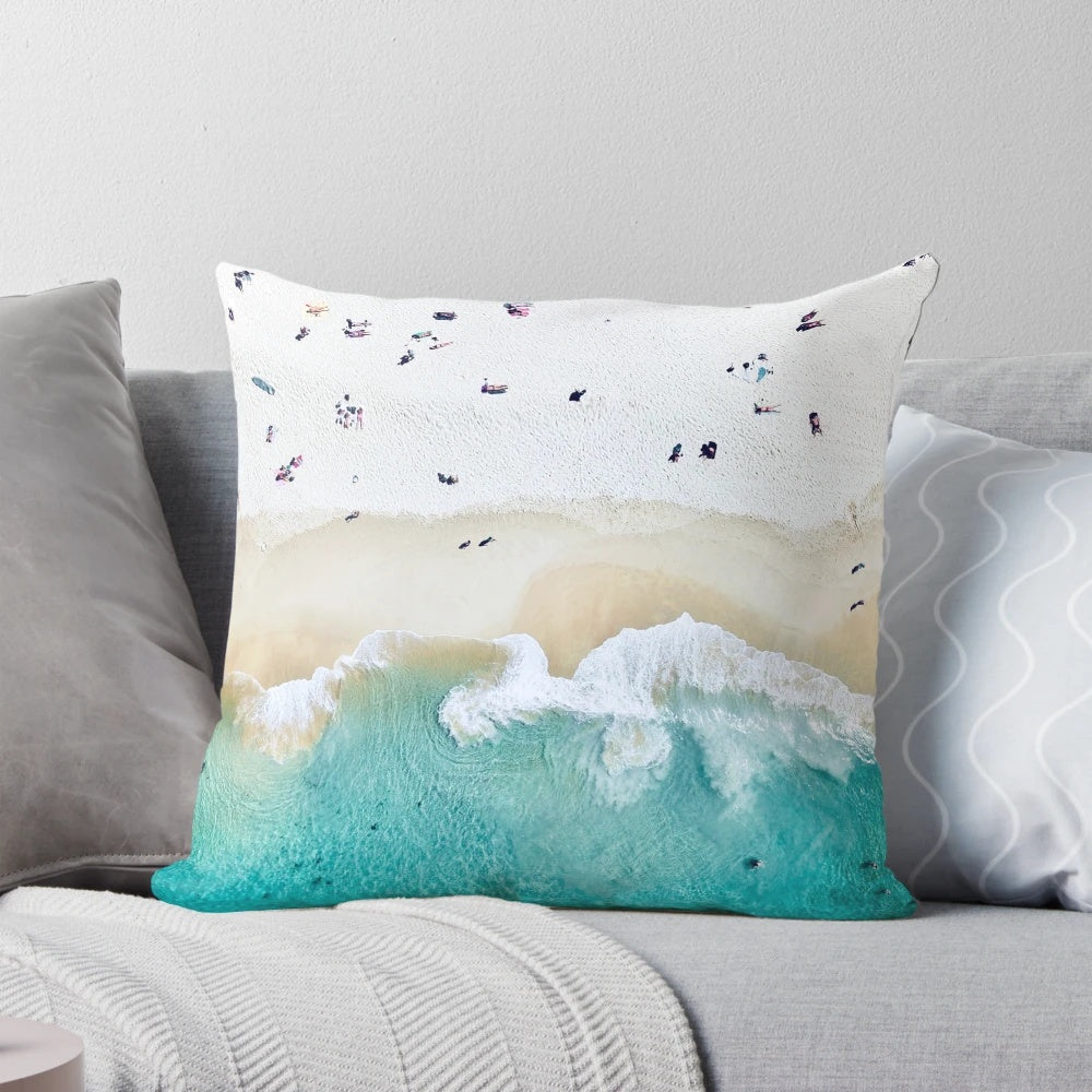 Summer-inspired pillow with beach and surf motifs