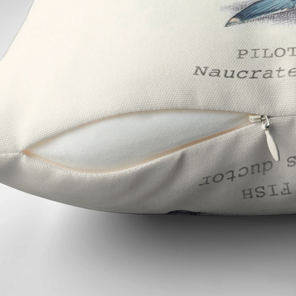 A whimsical and nautical-inspired pillow featuring a pilot fish design, perfect for travel and aviation enthusiasts.