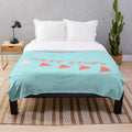 Soft and cozy plush blanket with entertainment-themed design