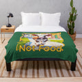 Plush blanket featuring a cute calf, symbol of animal welfare and compassion