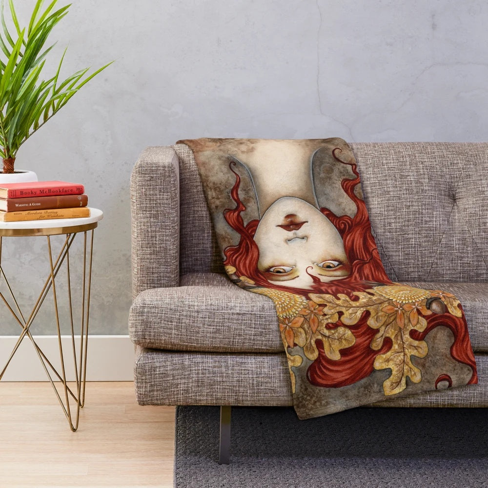 Autumn plush blanket with warm colors and nature-inspired design
