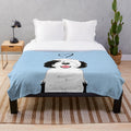 Soft black and white sheepadoodle plush blanket