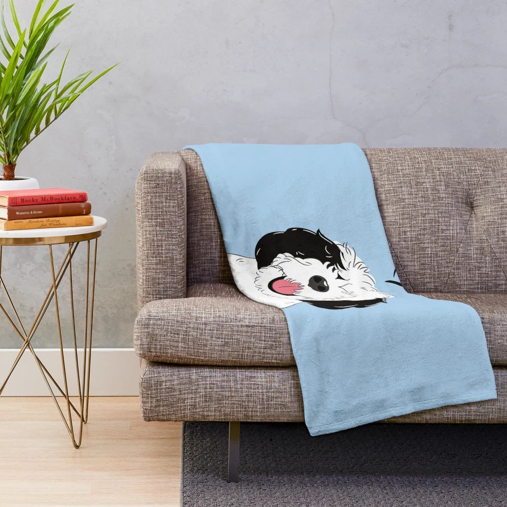 Soft black and white sheepadoodle plush blanket