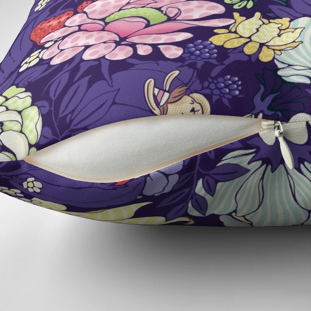 A plush, decorative pillow featuring a whimsical garden party design with bunnies, flowers, and blueberry tea.