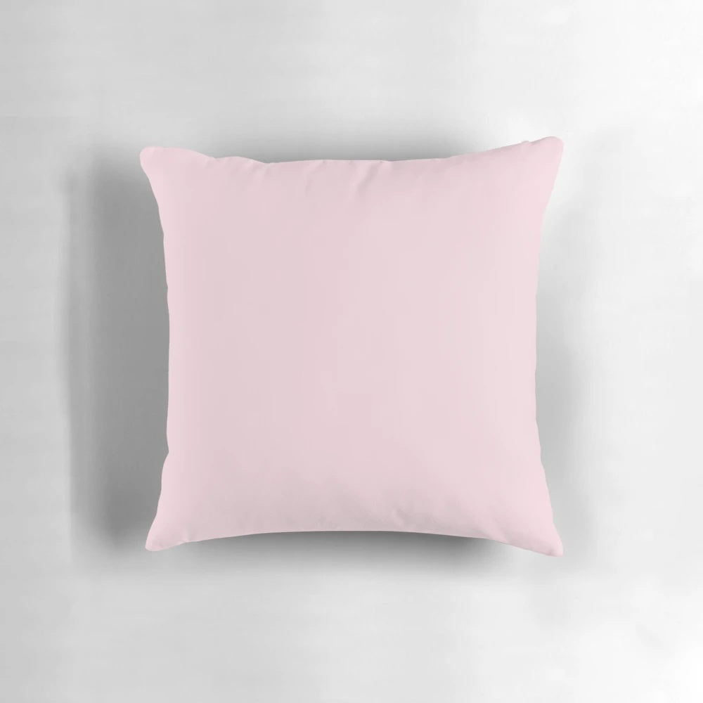 Soft and plush blush pink pillow with a luxurious cotton candy feel