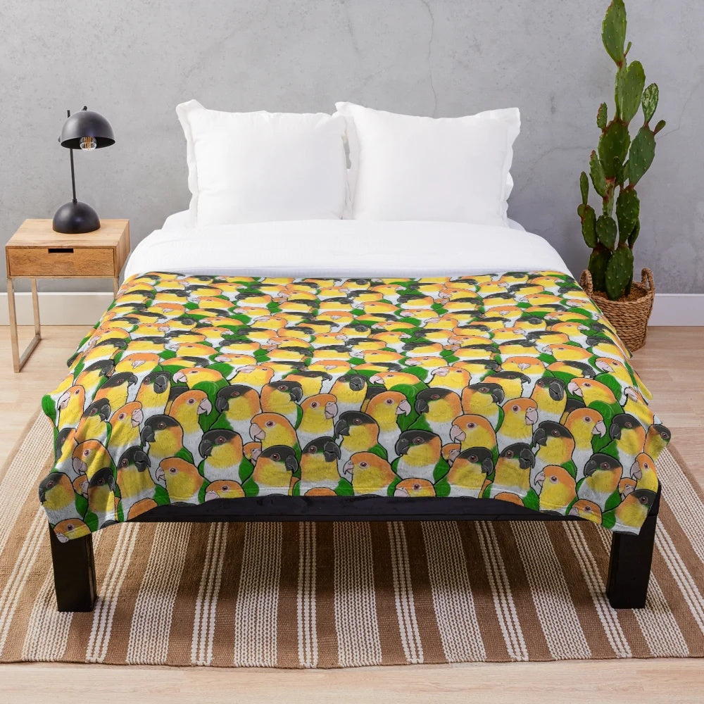 Soft and cuddly plush blanket featuring a cute caique parrot design