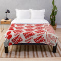 Cherry dum dum plush blanket with a lollipop design