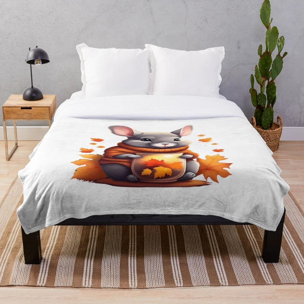 Soft and cuddly chinchilla plush blanket with cozy autumn and fall design