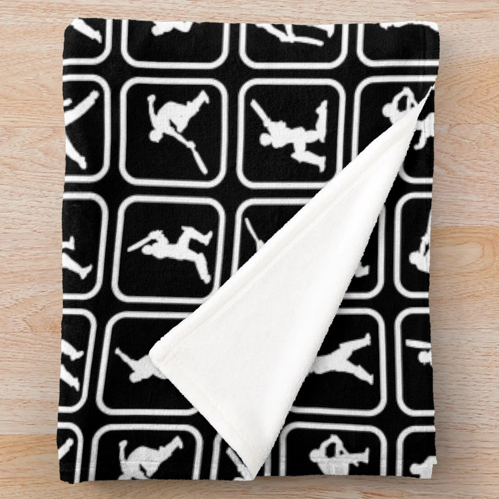 Plush cricket-themed blanket with iconic cricket player motifs