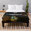 Plush blanket featuring characters Nick and Adalind from the TV show Grimm